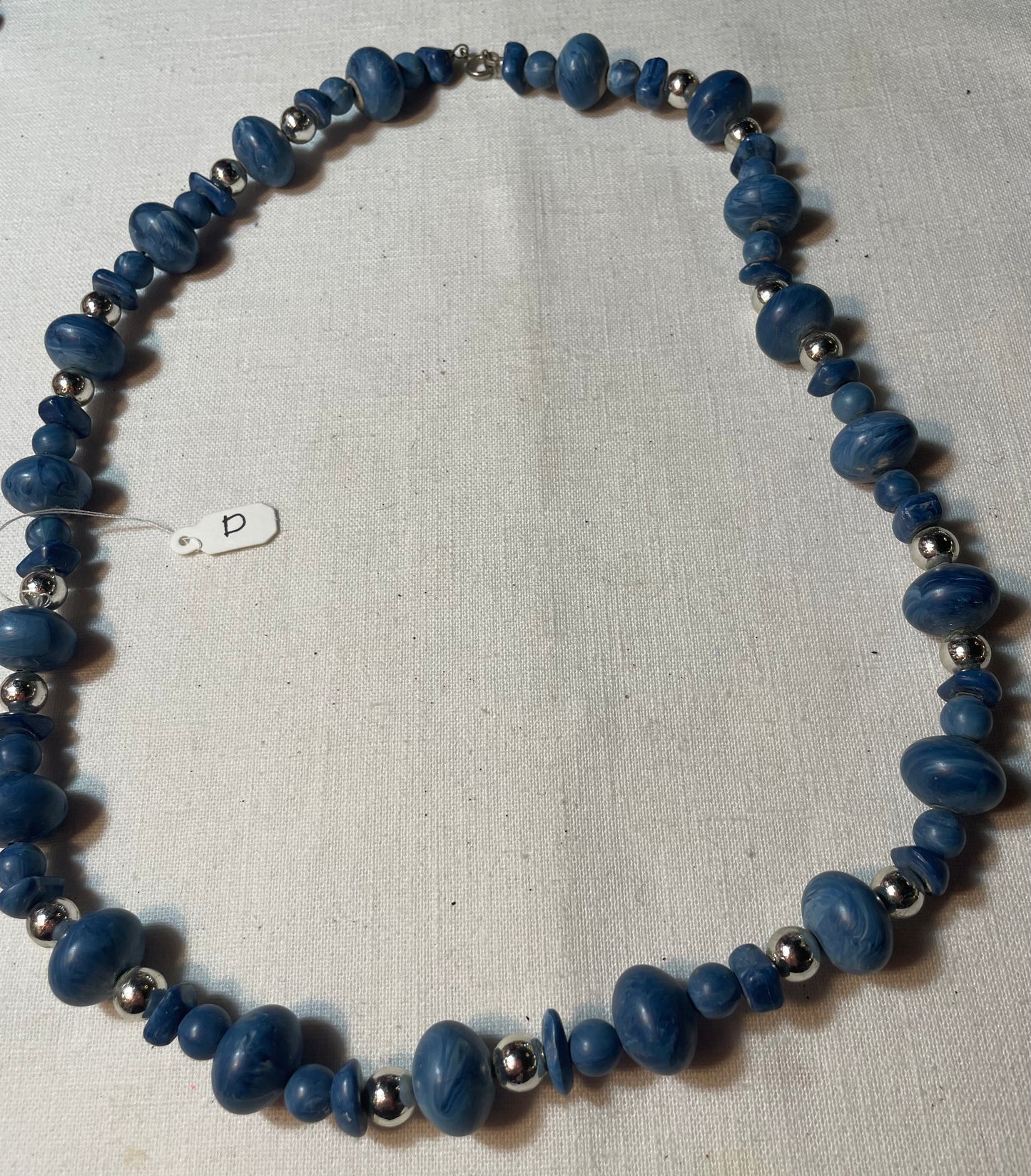 A lot of vintage blue and silver tone jewelry