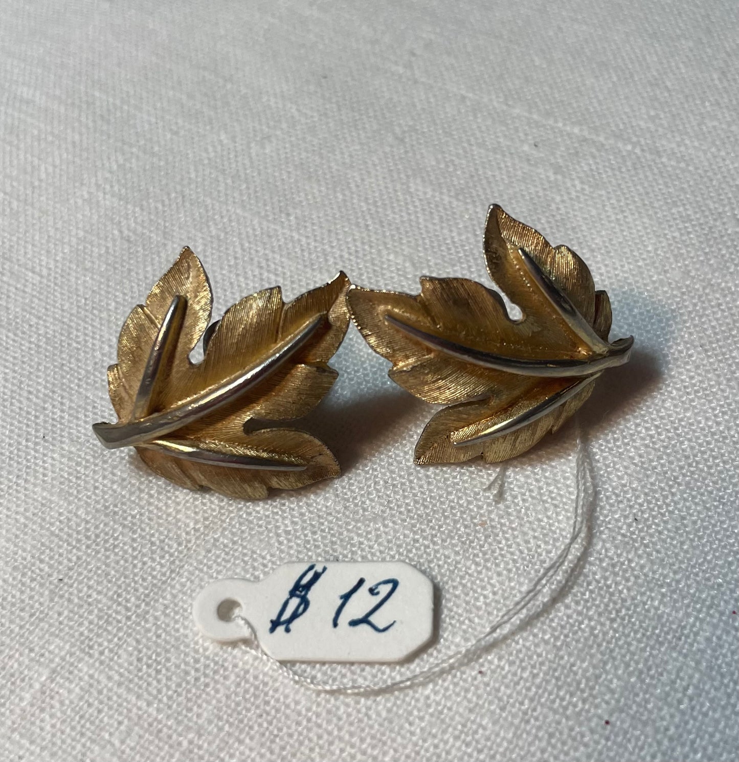 A pair of vintage gold leaf earrings