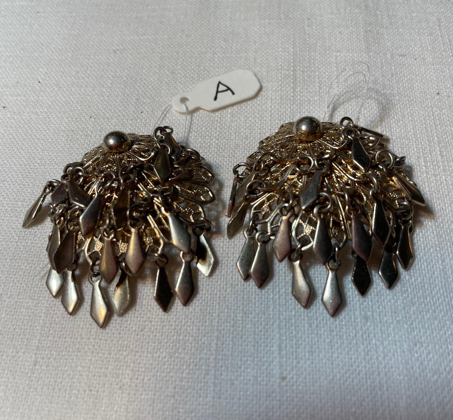 A pair of beautiful, flapper style vintage metal earrings