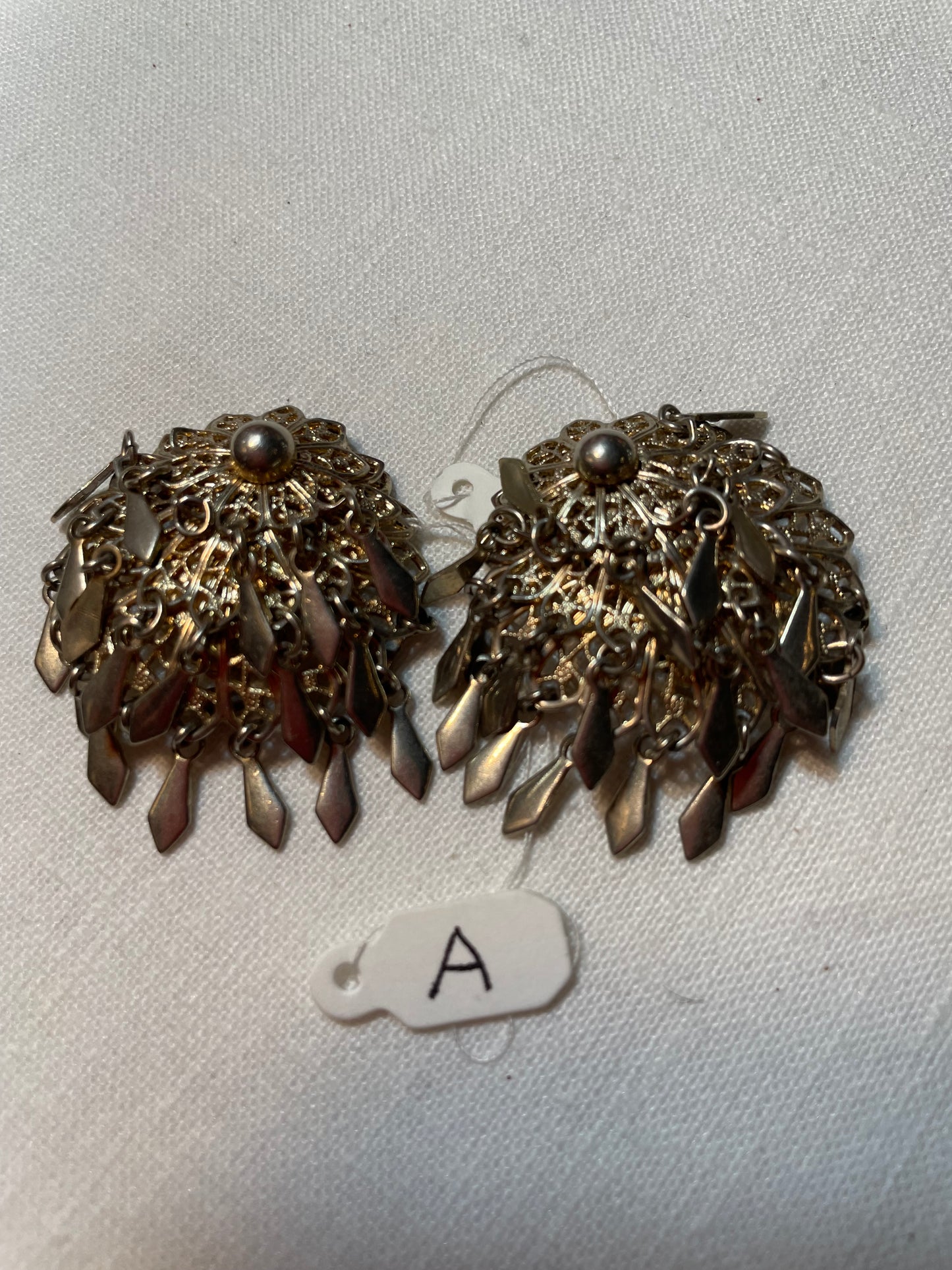 A pair of beautiful, flapper style vintage metal earrings